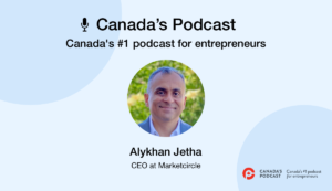 Graphic shows Alykhan Jetha's round shaped photo at the centre. At the top, a title reads "Canada's Podcast". Below the title, a subhead reads "Canada's #1 podcast for entrepreneurs".